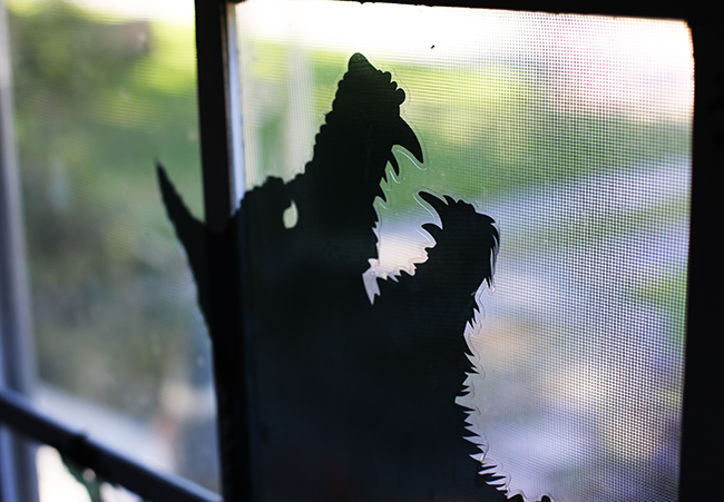 window decals of spooky monster